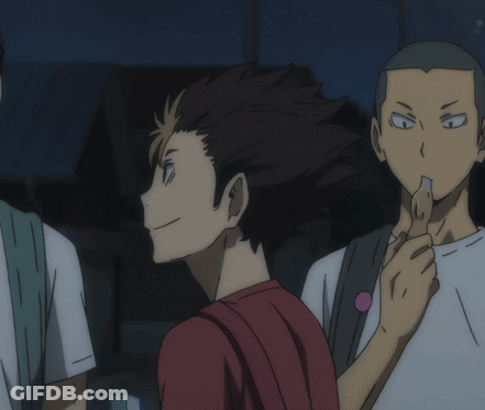 A Man In A Red Shirt Is Holding A Piece Of Paper GIF