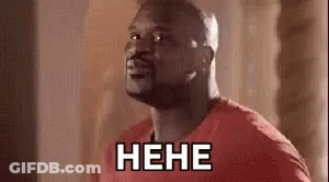 A Man In A Red Shirt Is Laughing With The Word Nene Written On His Chest . GIF