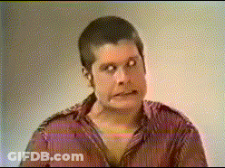A Man In A Red Shirt Is Making A Face GIF