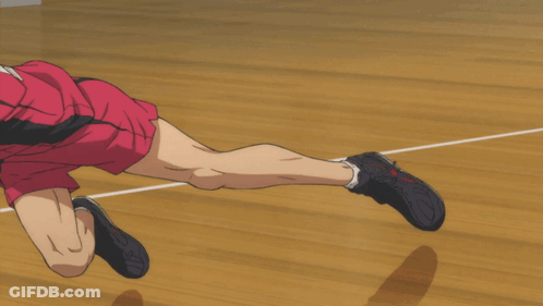 A Man In A Red Shirt Is Playing Volleyball With A Yellow Ball GIF