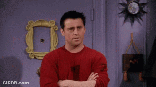A Man In A Red Shirt Is Pointing At The Camera And Saying You Almost GIF