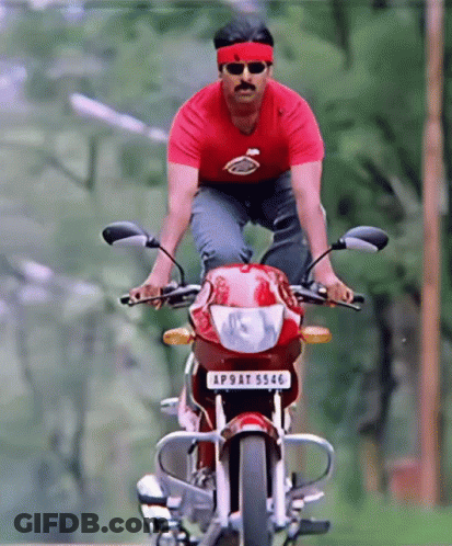 A Man In A Red Shirt Is Riding A Motorcycle With A License Plate That Says Ap9at 5556 GIF