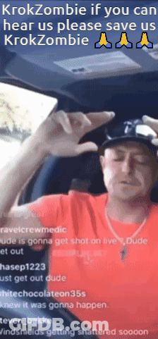 A Man In A Red Shirt Is Sitting In A Car With The Words Krokzombie If You Can Hear Us Please Save Us GIF