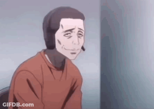 A Man In A Red Shirt Is Sitting In A Chair And Smiling . GIF