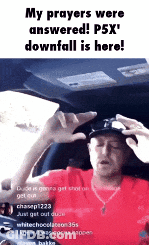 A Man In A Red Shirt Is Sitting In The Driver 'S Seat Of A Car GIF
