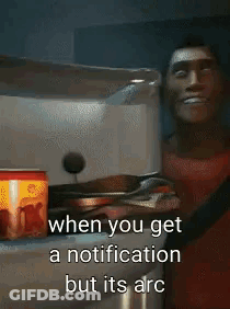 A Man In A Red Shirt Is Standing In Front Of A Stove With A Can Of Soda In The Background . GIF