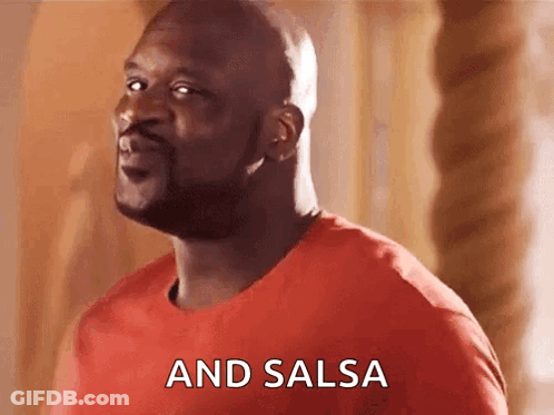 A Man In A Red Shirt Is Talking About Salsa . GIF