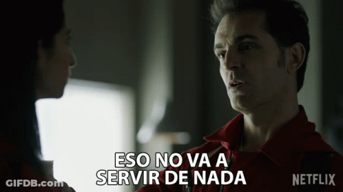 A Man In A Red Shirt Is Talking To A Woman With The Words Eso No Va A Servir De Nada Above Him GIF