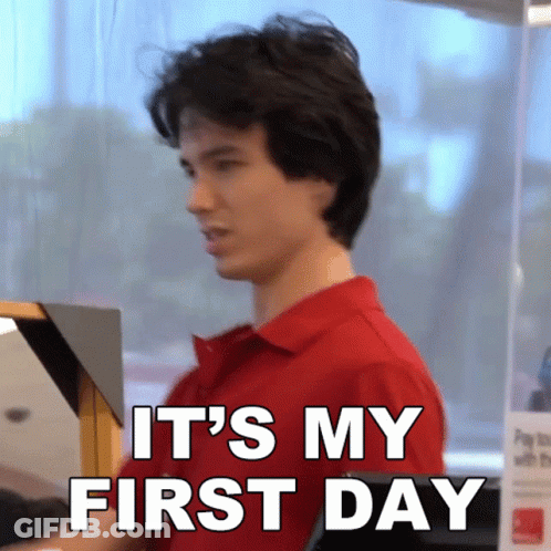 A Man In A Red Shirt Says It 'S My First Day In White Letters GIF