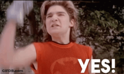 A Man In A Red Shirt Says Yes In White Letters GIF