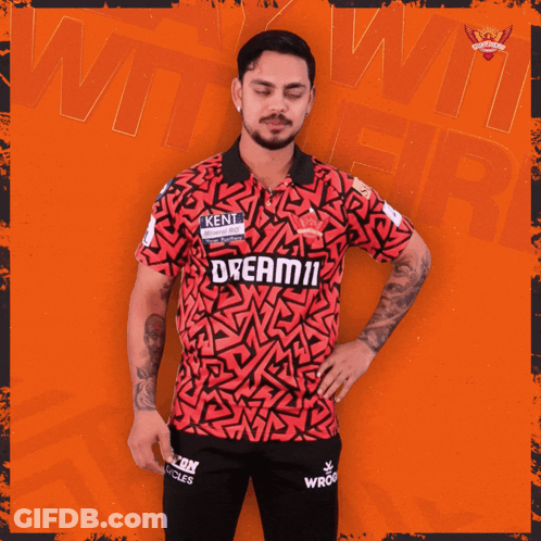 A Man In A Red Shirt That Says Dream11 GIF