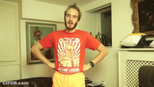 A Man In A Red Shirt That Says Falcon Lovers On It GIF