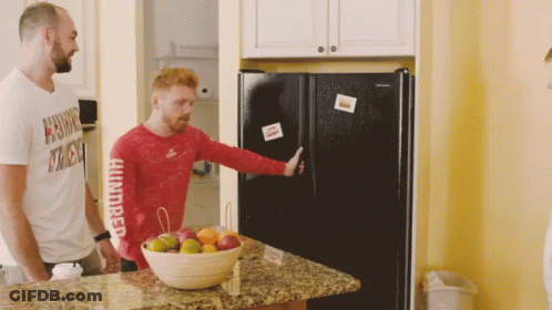 A Man In A Red Shirt That Says Hundred On The Sleeve GIF
