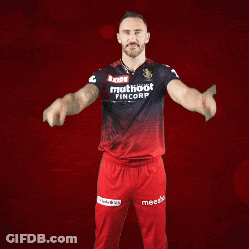 A Man In A Red Shirt That Says Muthoot Fincorp On It GIF