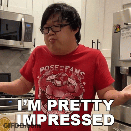A Man In A Red Shirt That Says Pose For Fans GIF