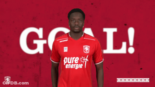 A Man In A Red Shirt With Oure Energie Written On It GIF