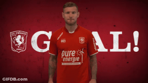 A Man In A Red Shirt With Pure Energie On It GIF
