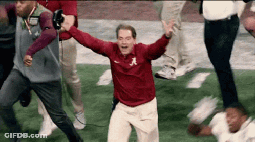A Man In A Red Shirt With The Letter A On It Is Running On A Field GIF