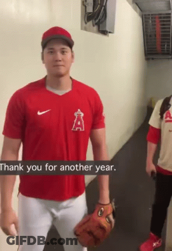 A Man In A Red Shirt With The Letter A On The Front GIF