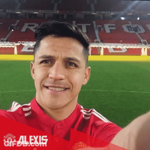 A Man In A Red Shirt With The Name Alexis On The Front GIF