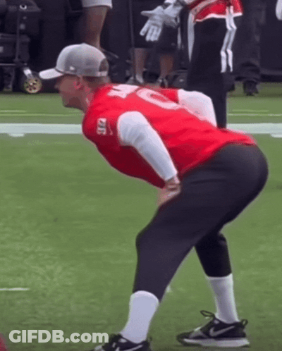 A Man In A Red Shirt With The Number 10 On It GIF