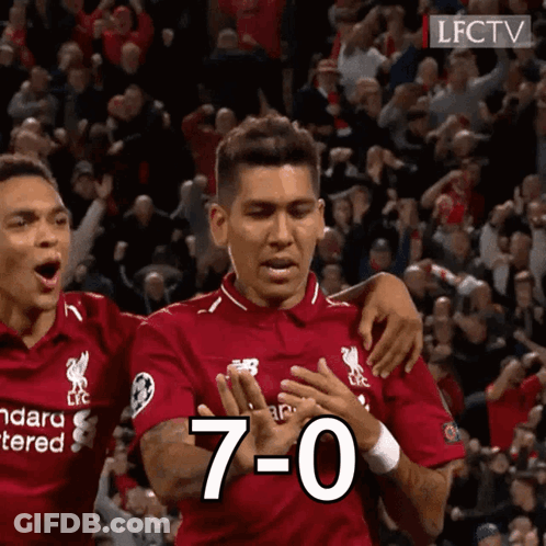 A Man In A Red Shirt With The Number 7 On His Chest GIF
