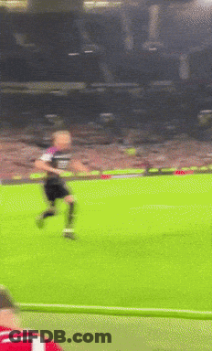 A Man In A Red Shirt With The Number 7 On It Is Watching A Soccer Game GIF