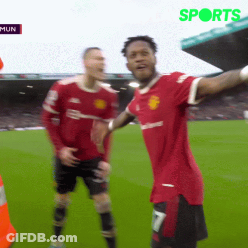 A Man In A Red Shirt With The Number 7 On It GIF