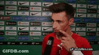 A Man In A Red Shirt With The Number 7 On It GIF