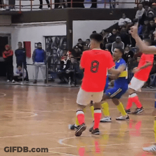 A Man In A Red Shirt With The Number 8 On The Back GIF