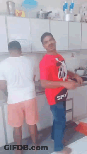 A Man In A Red Shirt With The Word Sport On It GIF