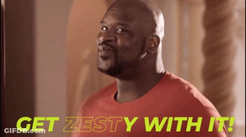A Man In A Red Shirt With The Words Get Zesty With It Behind Him GIF