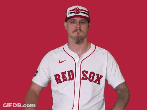 A Man In A Red Sox Jersey Giving A Thumbs Down Sign GIF