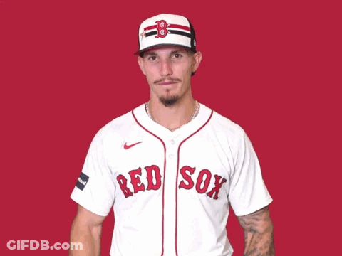 A Man In A Red Sox Jersey Is Giving A Thumbs Down GIF