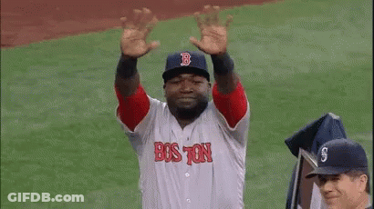 A Man In A Red Sox Uniform Is Standing On A Baseball Field . GIF