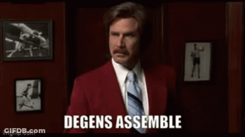 A Man In A Red Suit And Tie Is Holding A Piece Of Paper In His Hand And Says Degens Assemble . GIF