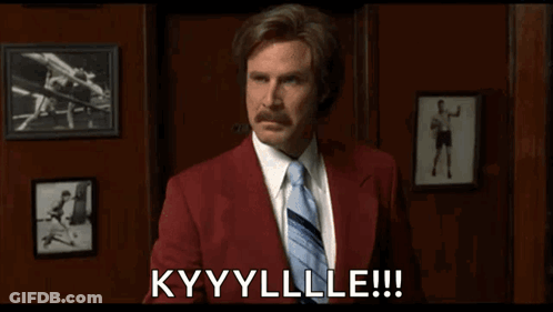 A Man In A Red Suit And Tie Is Saying " Kyyylle " GIF