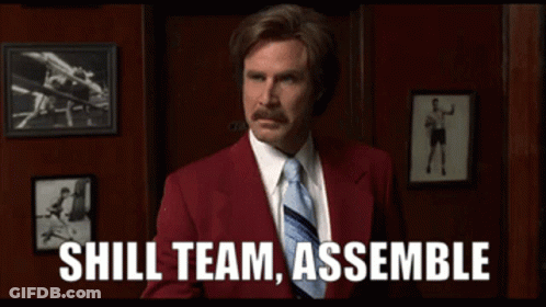 A Man In A Red Suit And Tie Is Saying " Shill Team Assemble " GIF