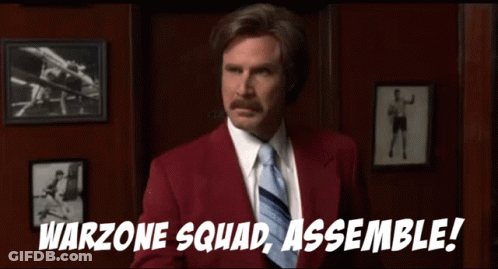 A Man In A Red Suit And Tie Says Warzone Squad Assemble ! GIF