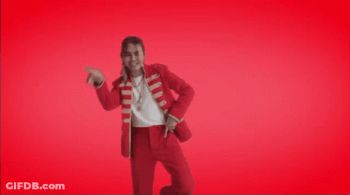 A Man In A Red Suit Is Dancing In Front Of A Red Background That Says ' Til Week End ' GIF