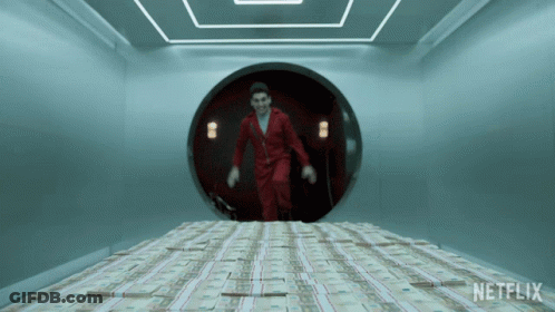 A Man In A Red Suit Is Running Through A Tunnel Filled With Stacks Of Money And A Netflix Logo GIF