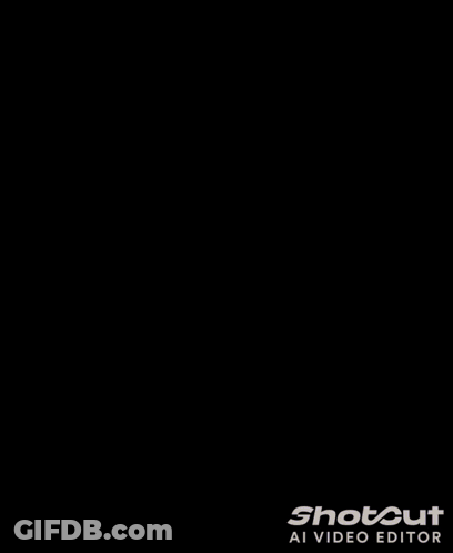A Man In A Red Suit Is Standing In Front Of A Fireplace With The Word Shotout At The Bottom GIF
