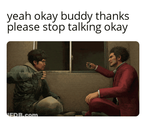 A Man In A Red Suit Talks To Another Man GIF