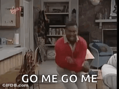 A Man In A Red Sweater Is Dancing In A Living Room While Saying `` Go Me Go Me '' . GIF