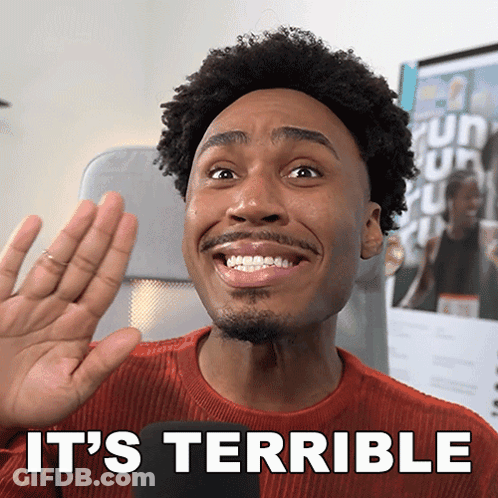 A Man In A Red Sweater Says It 'S Terrible While Smiling GIF