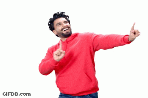 A Man In A Red Sweatshirt Is Pointing Up With His Fingers GIF