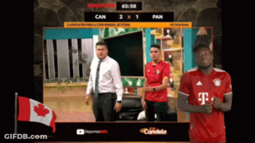 Man In Red T-Mobile Shirt In Front Of Canadian Flag GIF