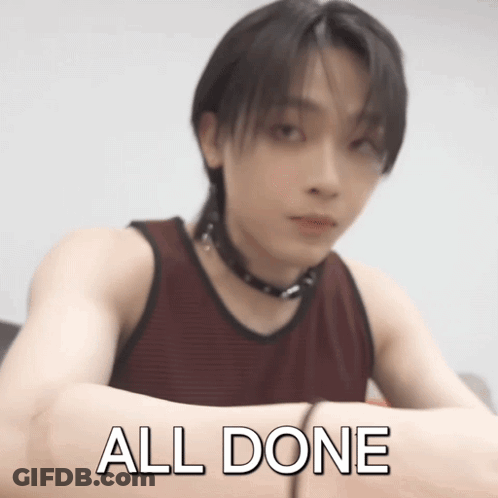 A Man In A Red Tank Top Has His Arms Crossed And The Words All Done Written On His Arm GIF