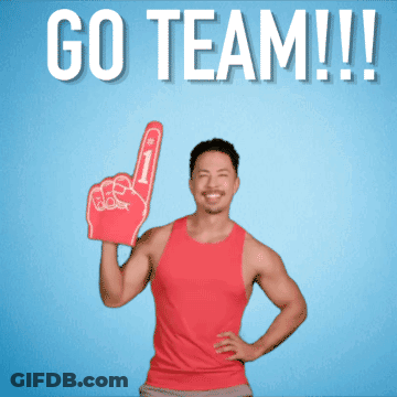 A Man In A Red Tank Top Holds Up A Foam Finger And Says " Go Team " GIF