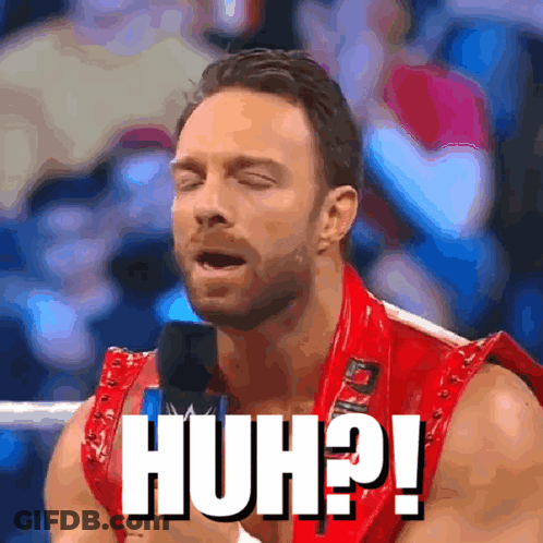 A Man In A Red Vest With The Word Huh Written On His Chest GIF